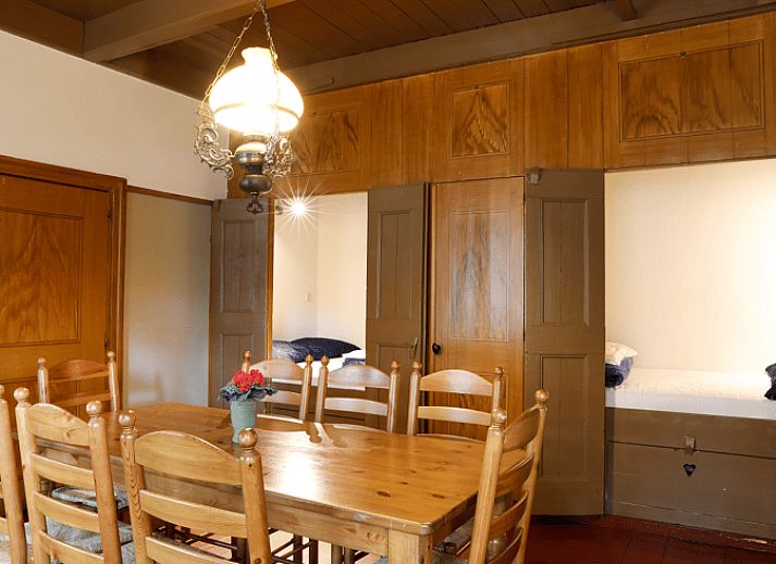 Spacious terrace at vacation home in Orvelte, Central Drenthe, ideal for outdoor meals.