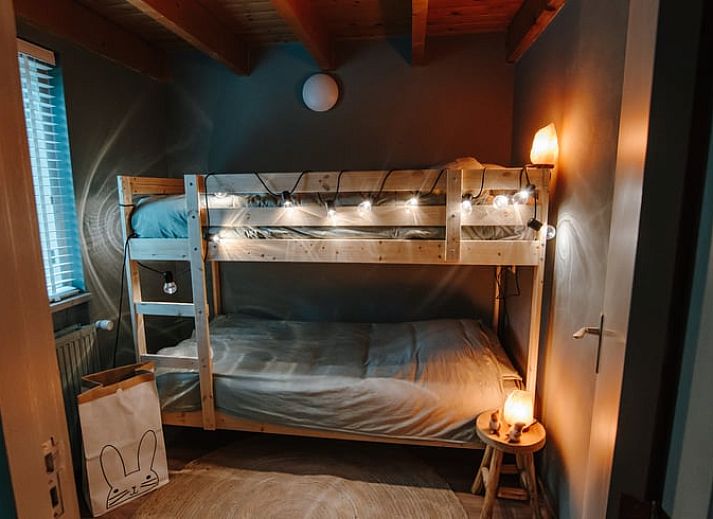 Gemuetliches Wohnzimmer in Cottage in Gasselte, Ferienhaus in Drenthe mit Blick auf den Wald.