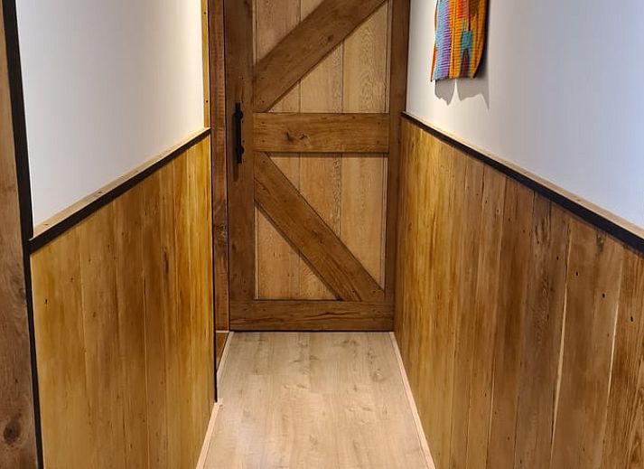 Evening in the garden of Holiday Home in Gasselte, Middle Drenthe, with cozy fire pit and comfortable seating.