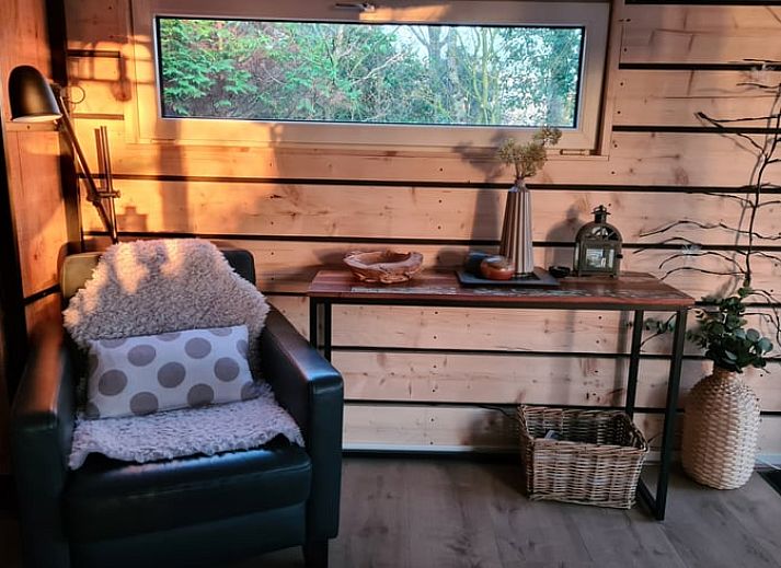 Evening in the garden of Holiday Home in Gasselte, Middle Drenthe, with cozy fire pit and comfortable seating.