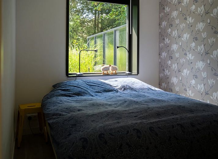 Vacation cottage in Gasselte with spacious garden surrounded by woodland in Drenthe.