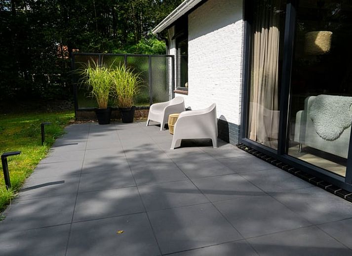 Veranda of Holiday Home in Gasselte overlooking green surroundings in Central Drenthe.