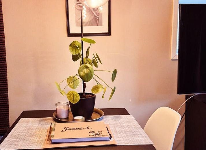 Bedroom in Holiday Home in Gasselte with beautiful nature theme on the wall.