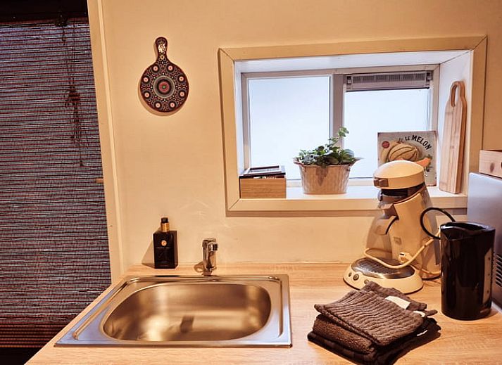 Bedroom in Holiday Home in Gasselte with beautiful nature theme on the wall.
