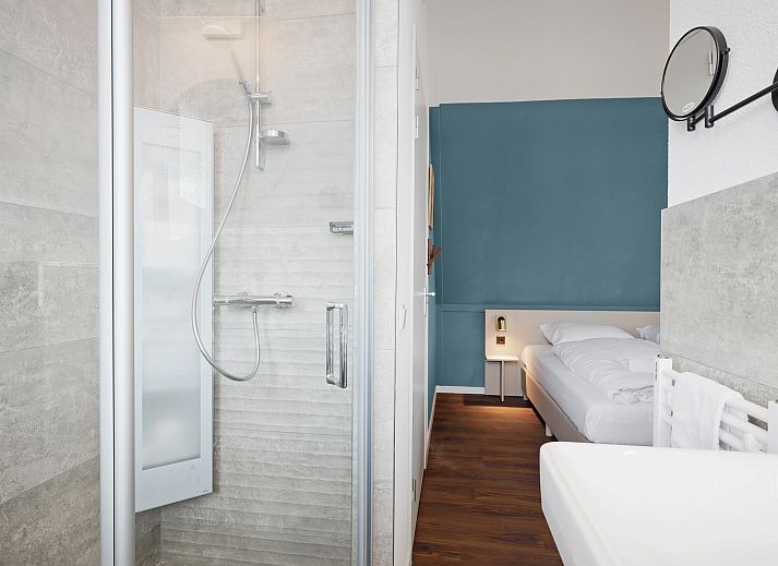 Gezellige zithoek met open haard in 6-persoons woning 6ELW, Westerbork, Drenthe.