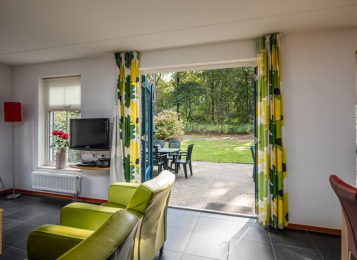 Zandduin Villa 12, a charming vacation home in Hooghalen, Central Drenthe, with a traditional brick facade and serene natural surroundings.