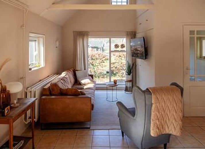 Vakantiehuisje in Hooghalen met charmante bakstenen gevel, gelegen in de natuur van Midden Drenthe, Drenthe.