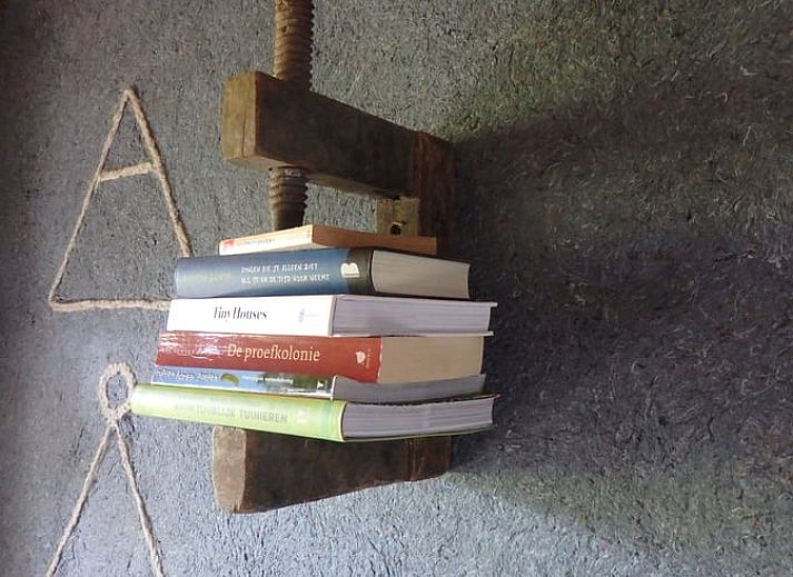 Cozy indoor space with rocking chair in cottage in Mantinge, Central Drenthe.