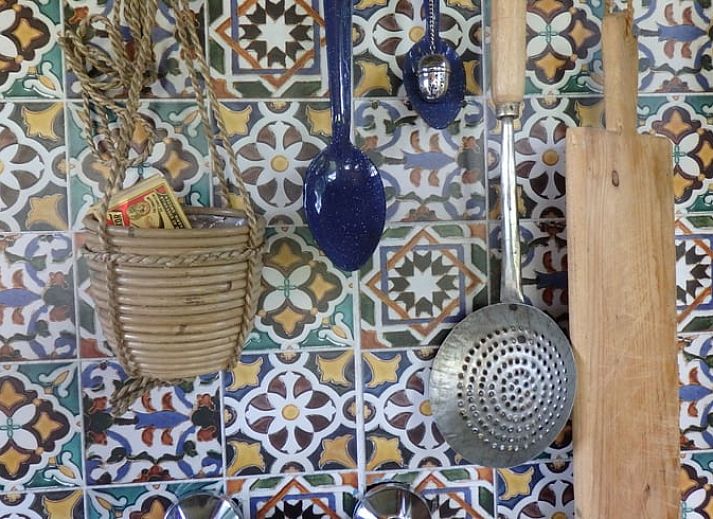 Cozy sitting area with wood stove in cottage in Mantinge, Central Drenthe.