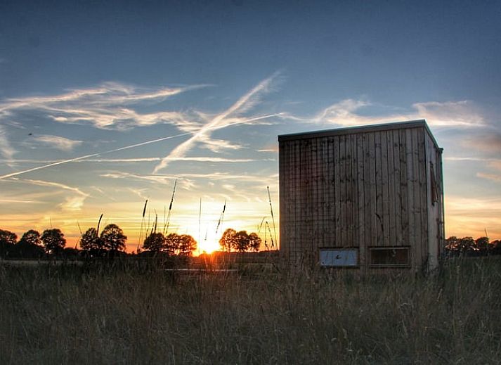 Enjoy a beautiful sunset at Holiday home in Mantinge, a unique vacation home in Central Drenthe, Drenthe.
