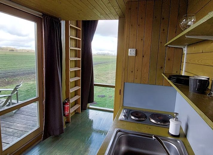 Geniessen Sie die Ruhe auf der Terrasse des Ferienhauses in Mantinge, das im malerischen Mittel-Drenthe liegt.