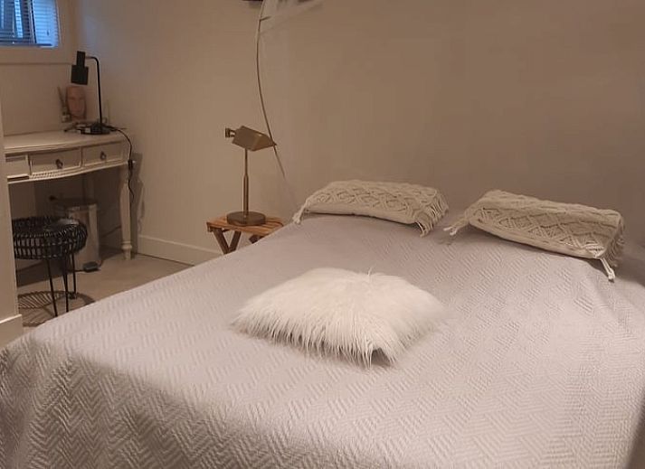 Blick auf den Garten vom Wohnzimmer des Huisje in Eesergroen, Ferienhaus in Drenthe.