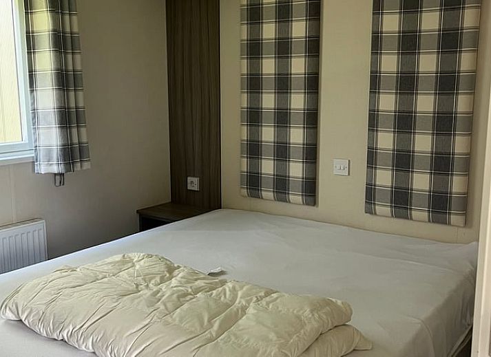 Vacation cottage in Eeserveen, Drenthe with sunny terrace and surrounding nature.