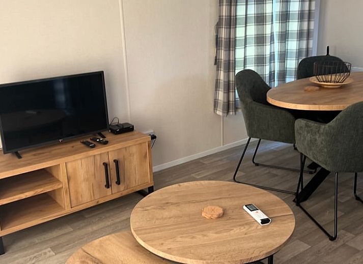 Vacation cottage in Eeserveen, Drenthe with sunny terrace and surrounding nature.