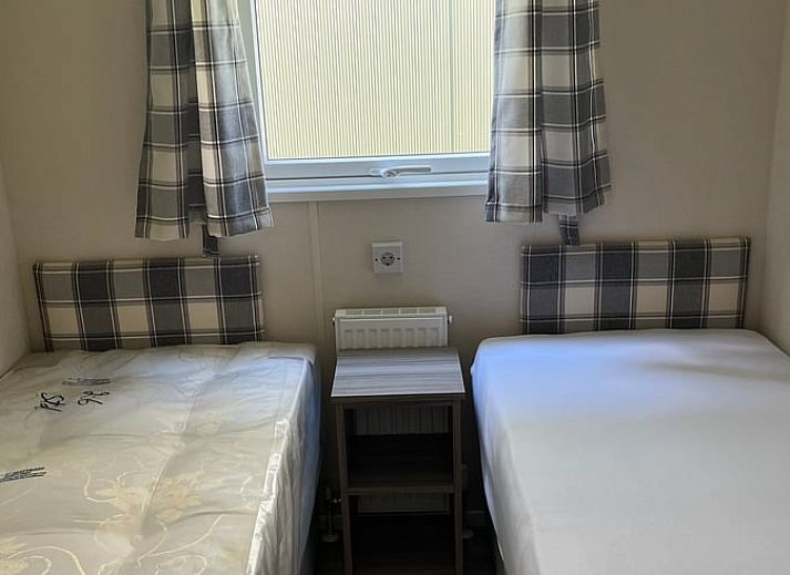 Vacation cottage in Eeserveen, Drenthe with sunny terrace and surrounding nature.