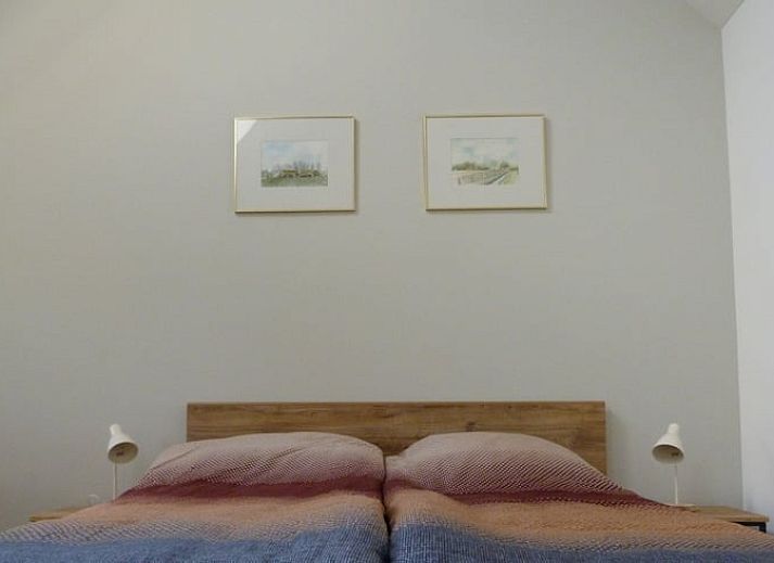 Cozy dining area in Holiday Home in Smilde, Central Drenthe overlooking terrace.