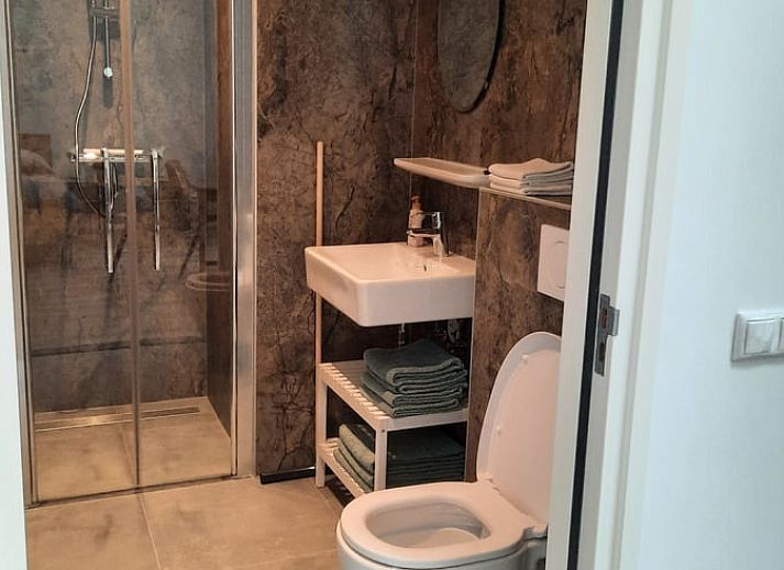 Comfortable bedroom in Cottage in Smilde, Midden Drenthe with modern amenities.