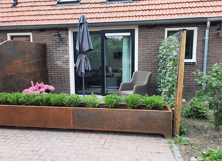 Comfortable bedroom in Cottage in Smilde, Midden Drenthe with modern amenities.