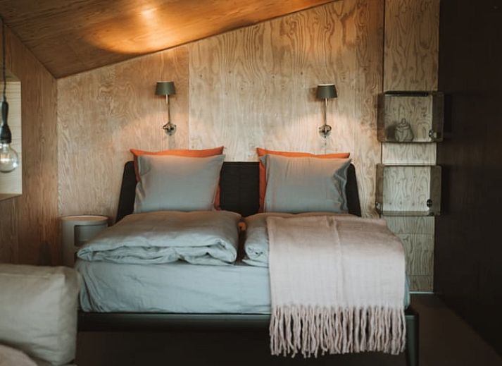 Ferienhaus in Odoorn, Zentral-Drenthe, Ferienunterkunft mit Veranda und Sitzwanne in laendlicher Umgebung.