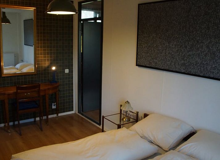 Gemuetlicher Innenbereich des Huisje in Nieuw Balinge, Ferienhaus in Zentral-Drenthe, mit stimmungsvollem Dekor und warmen Farben.