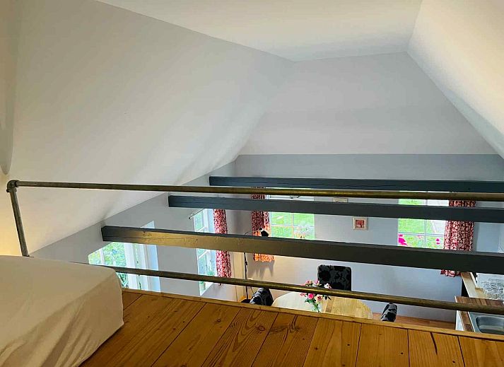 Gezellige woonkamer in DG1567 vakantiehuis, Westdorp, Midden Drenthe. Comfortabele zitruimte met moderne inrichting.