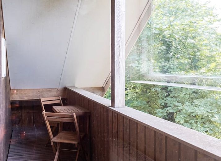 Gemuetliches Schlafzimmer im Ferienhaus in Een, Nord-Drenthe. Ferienhaus mit bequemen Betten fuer einen entspannten Aufenthalt in Drenthe.