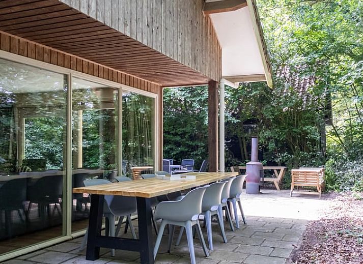 Gemuetliches Schlafzimmer im Ferienhaus "Huisje in Een" in Nord-Drenthe mit bequemen Betten und ruhiger Atmosphaere fuer einen entspannten Aufenthalt.