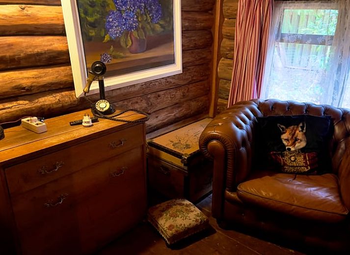 Buitenkant van Huisje in Norg, vakantiehuis in Norg, Noord Drenthe, omgeven door een natuurlijke omgeving.