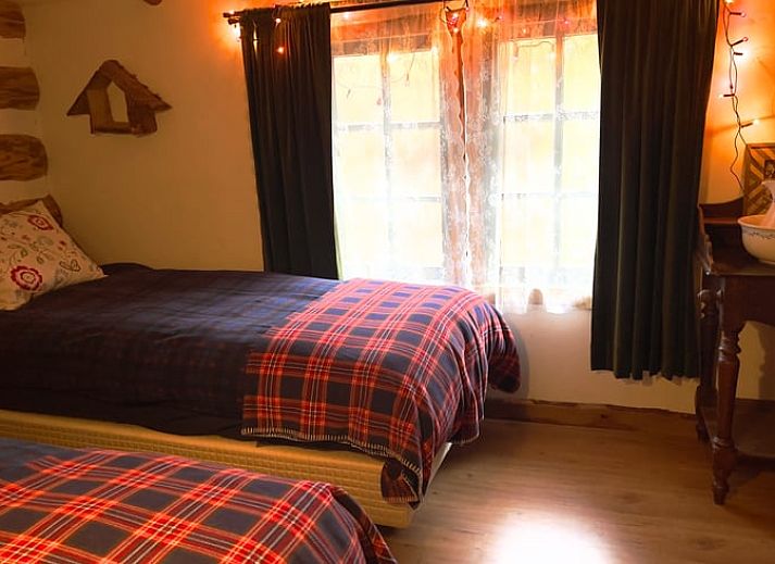 Buitenkant van Huisje in Norg, vakantiehuis in Norg, Noord Drenthe, omgeven door een natuurlijke omgeving.