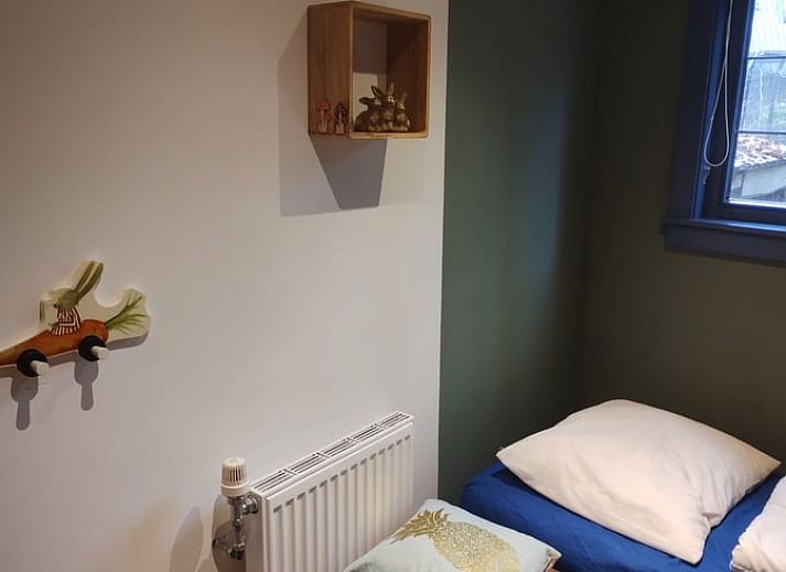 Ferienhaus in Norg, Nord-Drenthe, umgeben von ueppiger Natur, mit einer einladenden Terrasse fuer einen entspannten Aufenthalt.