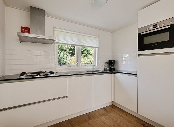 Gemuetliches Wohnzimmer des Ferienhauses DG1863 in Norg, Nord-Drenthe.