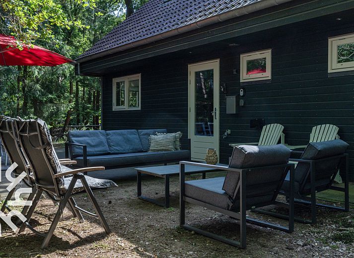 Cozy bedroom in vacation home DG131, Norg, Drenthe with comfortable bed.