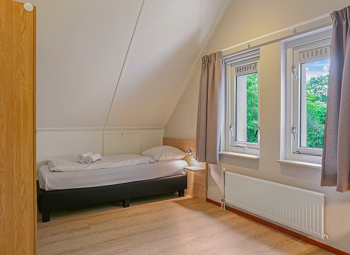 Gemuetliche Sitzecke mit Kamin in Het Land van Bartje, 4-Personen-Ferienwohnung in Ees, Drenthe.