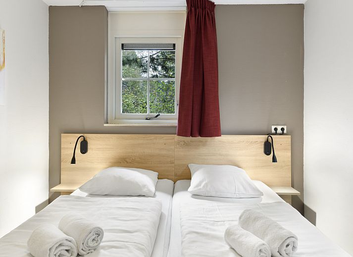 Stylish interior of Het Land van Bartje 6-person farm house in Ees, Drenthe, with modern furnishings.