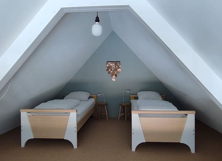 Gezellige woonkamer van Vakantiehuisje in Zeegse, Noord Drenthe, met comfortabele zithoek.