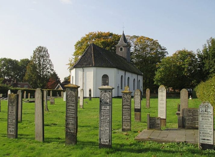 Gezellige eetruimte in Vakantiehuis in Drouwen, Noord Drenthe, met uitzicht op groene natuur.