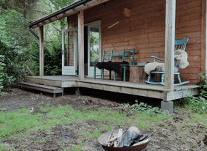 Uitzicht op de natuur vanuit Vakantiehuis in Drouwenerveen, Noord Drenthe, met comfortabele zitplek.