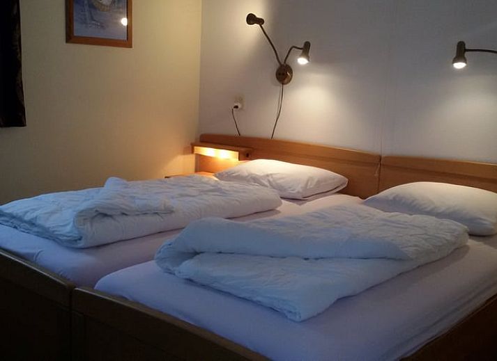 Rustige tuin bij Vakantiehuis in Meppen, Zuidoost Drenthe, ideaal voor ontspanning in de natuur.