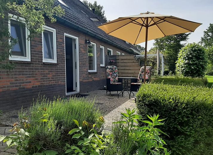 Gezellige woonkamer in Vakantiehuis in Meppen, perfect voor ontspanning in Zuidoost Drenthe.