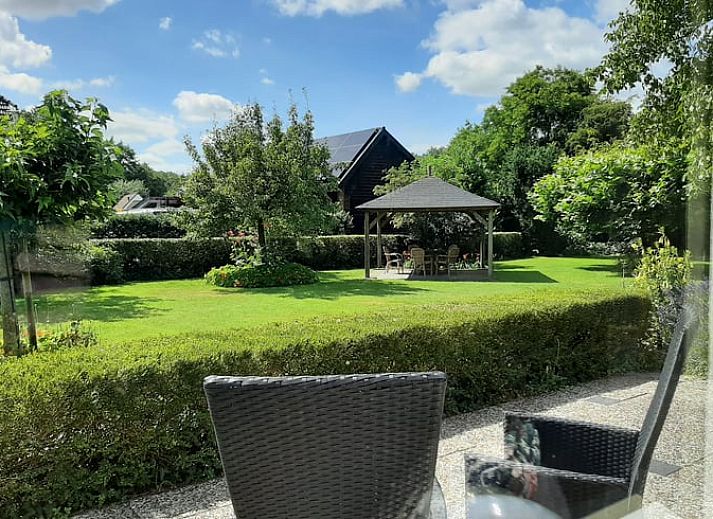 Gezellige woonkamer in Vakantiehuis in Meppen, perfect voor ontspanning in Zuidoost Drenthe.