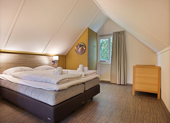 Cozy sitting area in Aelderholt 6-person bungalow 6CE, Aalden, Drenthe.