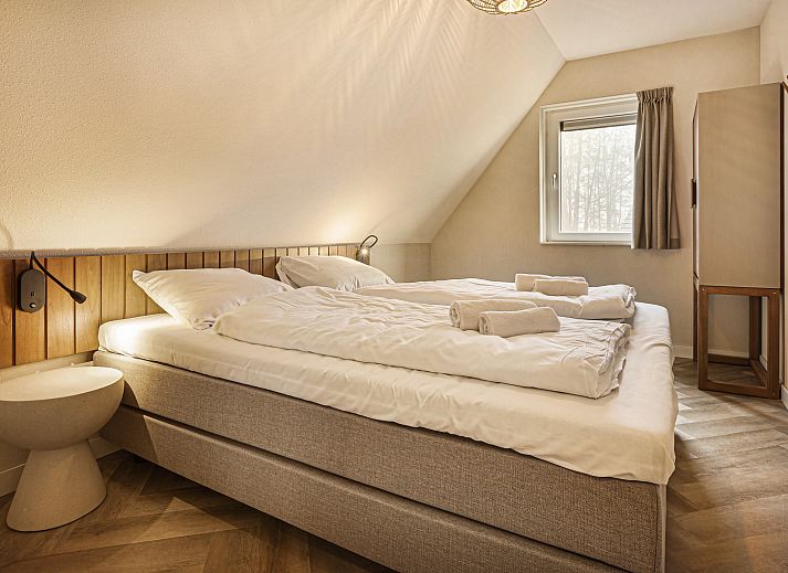 Spacious sitting room in Aelderholt bungalow, ideal for families in Aalden, Drenthe.