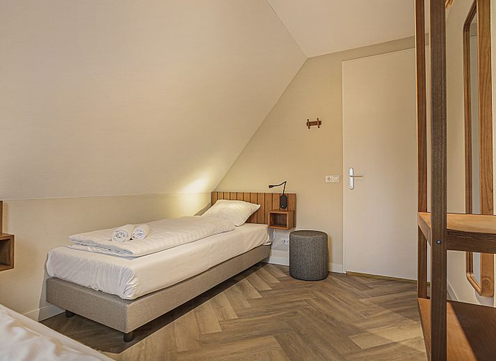 Spacious sitting room in Aelderholt bungalow, ideal for families in Aalden, Drenthe.