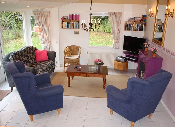 Clean holiday bungalow in Exloo, Drenthe with green garden and terrace for a relaxing stay.