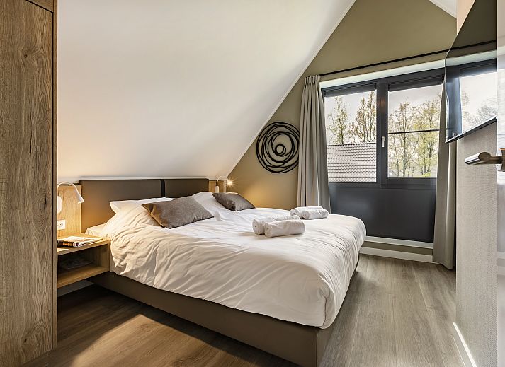 Wellness badkamer in PUUR Exloo vakantiehuis in Exloo, Drenthe met luxe sauna en moderne inrichting.