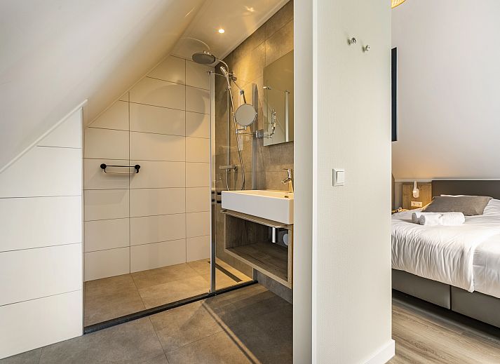 Buitenkant van PUUR Exloo 4-persoons vakantiehuis met groene tuin in Zuidoost Drenthe.