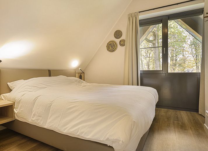 Stilvolle Sitzecke im Ferienhaus PUUR Exloo, ideal fuer Entspannung im Suedosten von Drenthe.