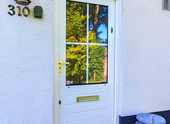 Aerial view of Cottage in Exloo, vacation home surrounded by trees in Exloo, Southeast Drenthe, Drenthe.