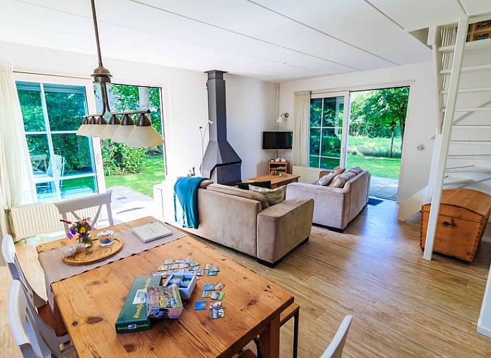 Aerial view of Cottage in Exloo, vacation home surrounded by trees in Exloo, Southeast Drenthe, Drenthe.