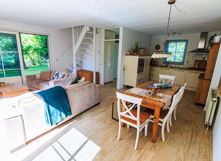 Aerial view of Cottage in Exloo, vacation home surrounded by trees in Exloo, Southeast Drenthe, Drenthe.